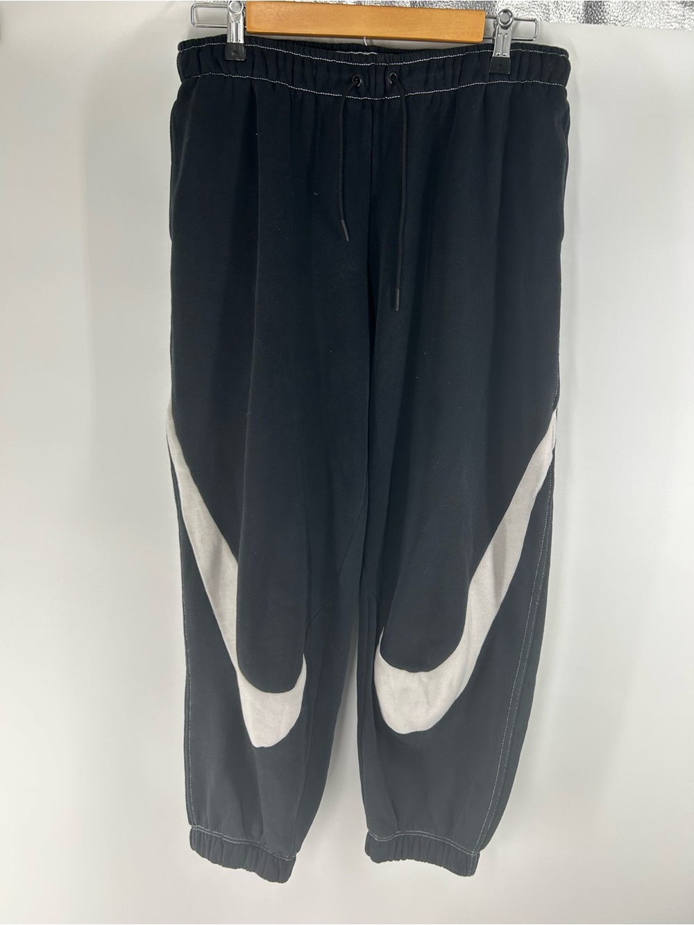 Nike Black Jogger Pants with White Swoosh Accent Medium